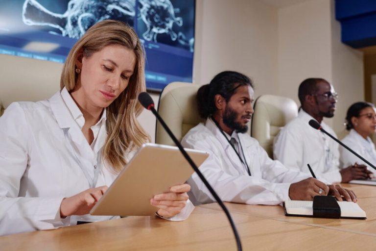 woman using tablet pc at conference 2023 12 21 21 42 31 utc 1024x683